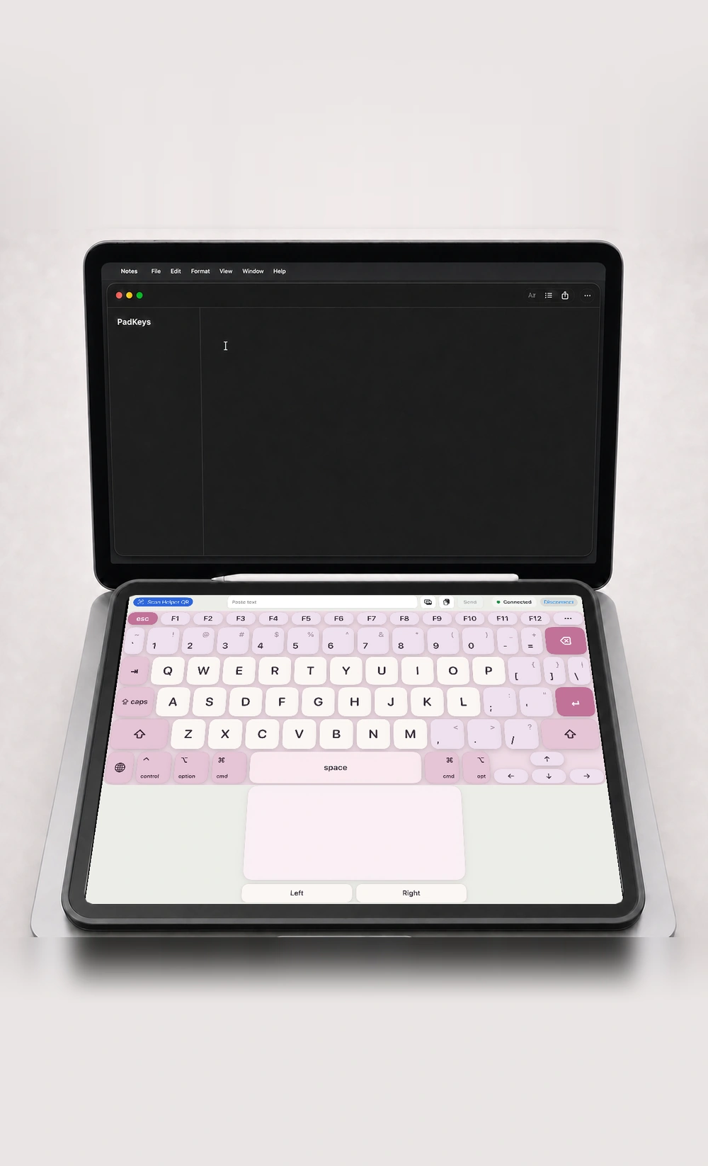 A laptop with an iPad below it acting as a full-screen keyboard and quick trackpad.